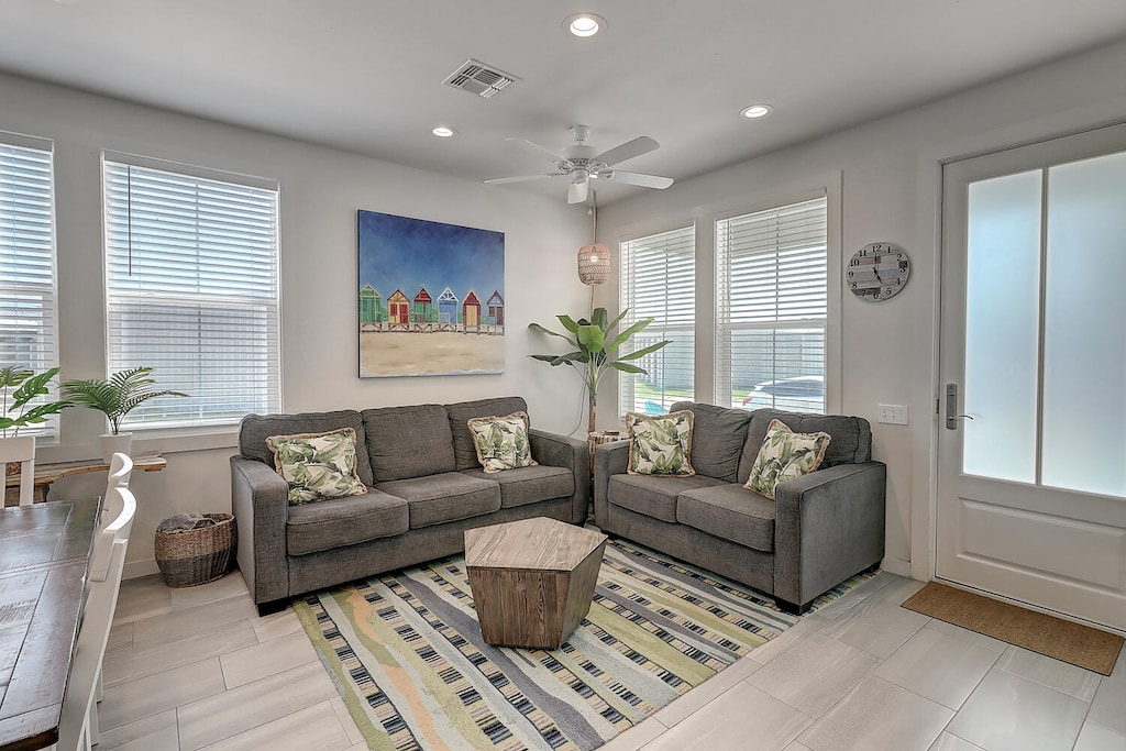 Indoor. Spacious and cozy living room perfect for relaxation