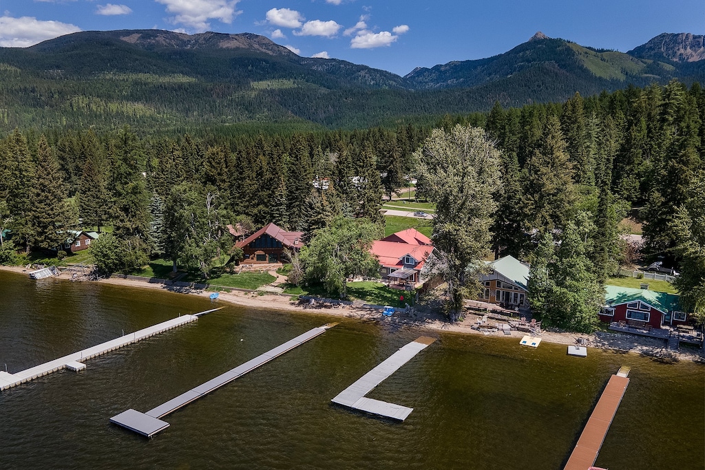 nestled in the Mountains and trees | Aerial