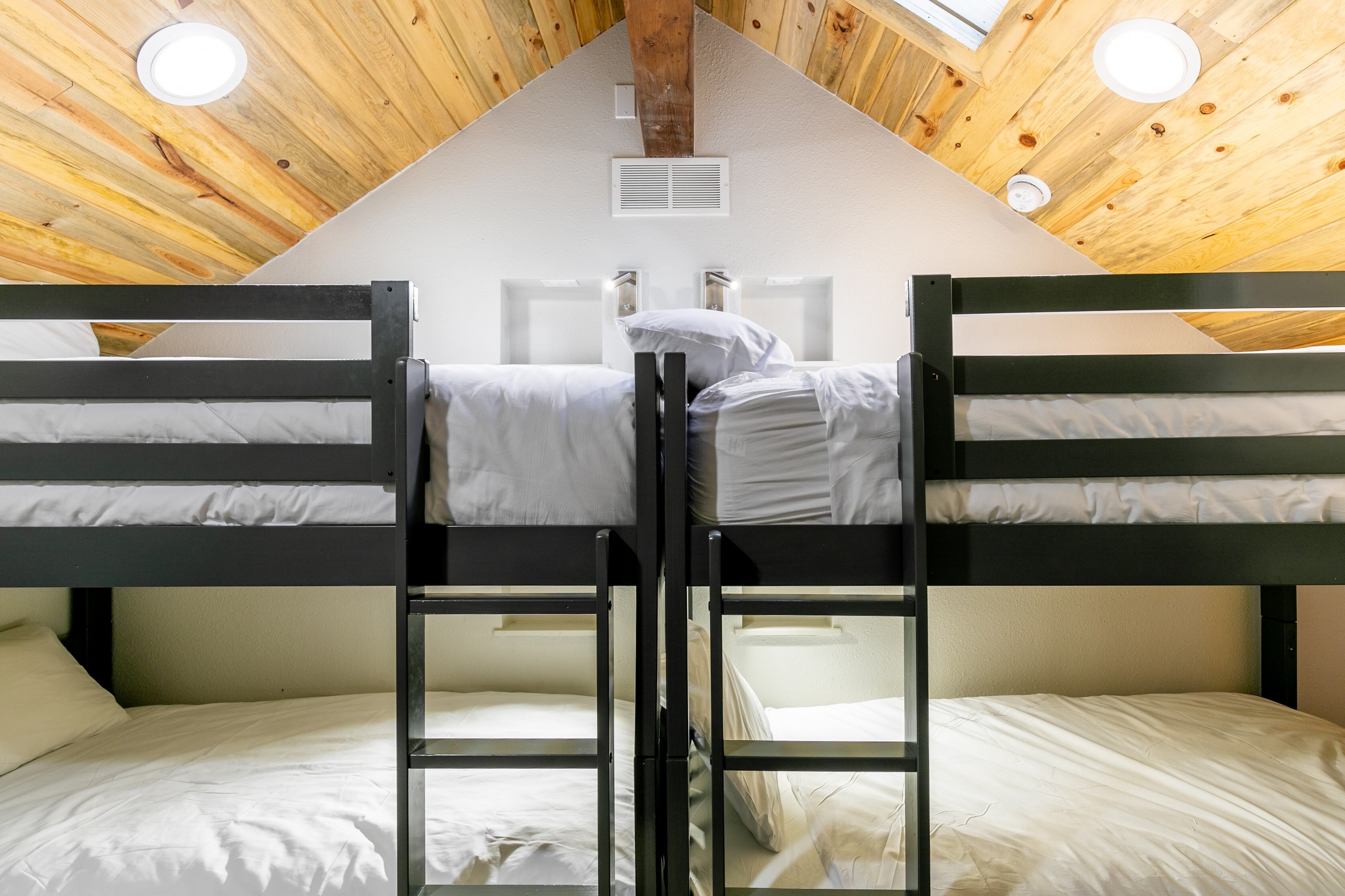 Bedroom 4 features two bunk beds.