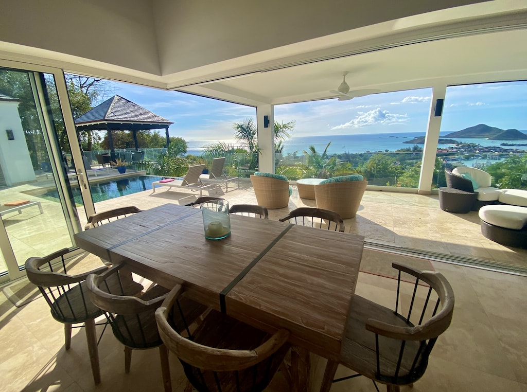 Stunning four bedroom villa, breathtaking panoramic sea views, private pool, alfresco dining with sun lounging at Sugar Ridge villa rental, Antigua 