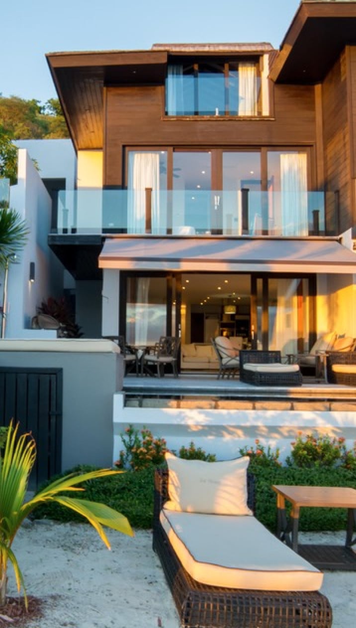 Stunning three-bedroom townhouse set on the water’s edge, with infinity plunge pool, magnificent sea views, sun loungers, outdoor shower, and BBQ Grill at Tamarind Hills Villa rental