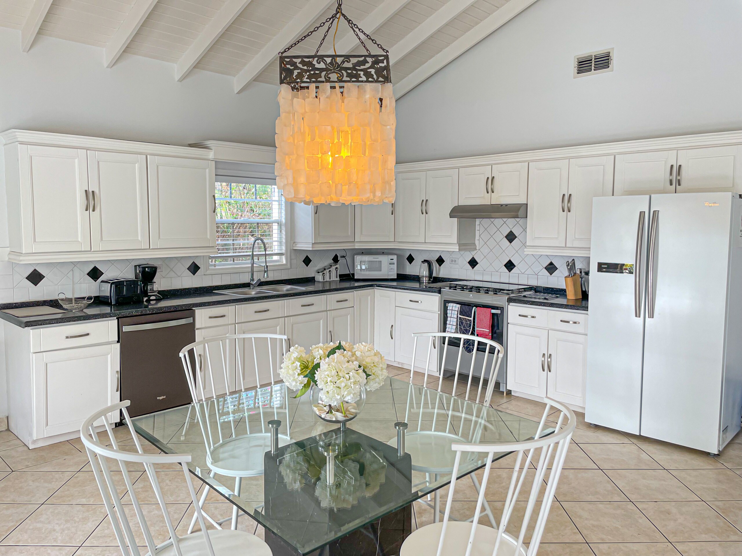 The stylishly furnished, large fully equipped kitchen at Harbour view villa rentals