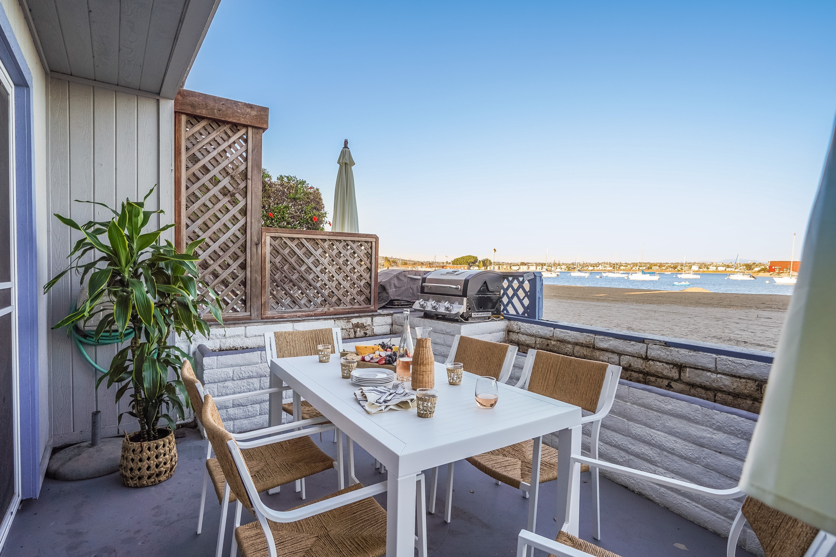 Patio right on the bay-side beach!