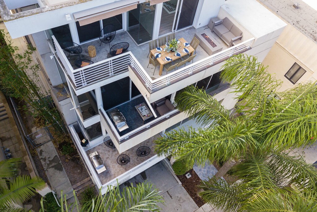 Welcome to Balboa II. Your home features a spacious outdoor balcony with plenty of room for entertaining (bottom floor).