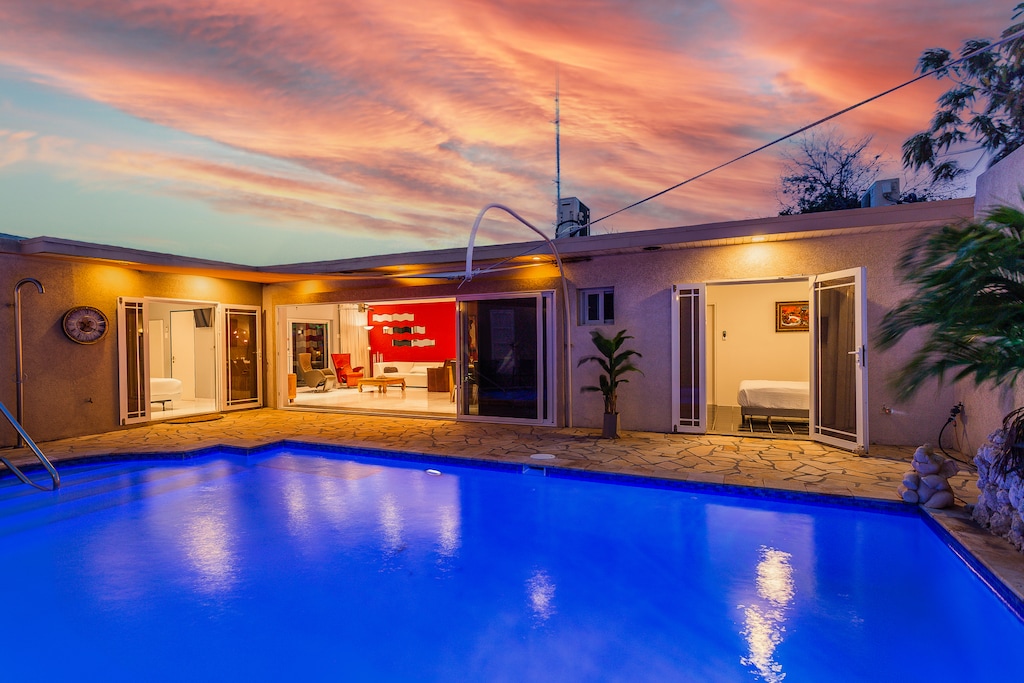 Embrace the magic of sunset from the serenity of our pool, where every evening paints a breathtaking canvas of color across the sky.