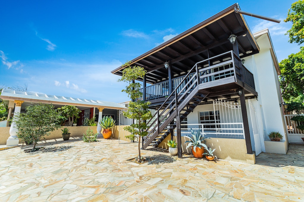 Enjoy the picturesque vista from our front yard, where every glance reveals a panorama of tranquility and charm, inviting you to embrace the beauty of home.