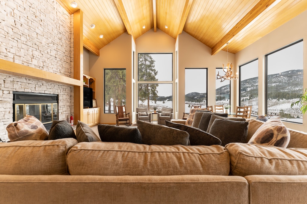 Living area featuring brand new furnishings and a new 65inch smart TV. 