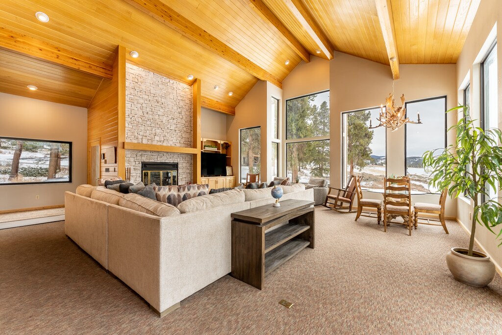 Cozy living area offering brand new furnishings and amazing mountain + golf course views.