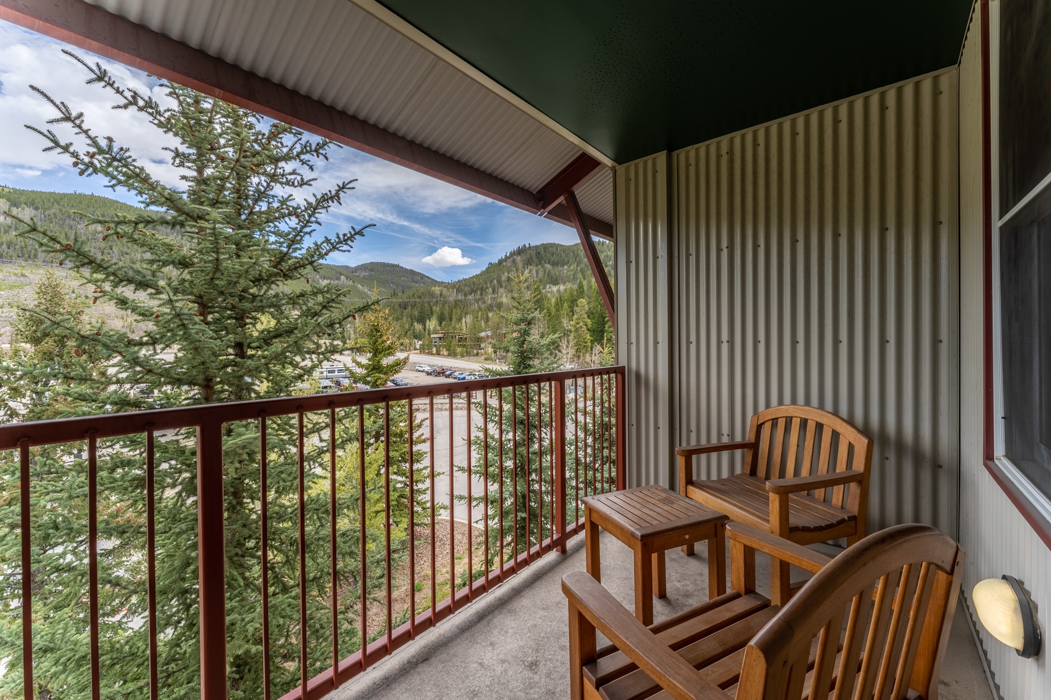 Private balcony with mountain views.