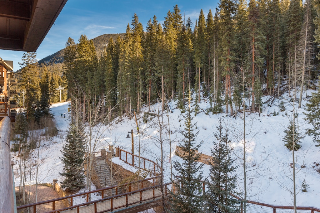 Private balcony with outdoor seating and ski-slope views!