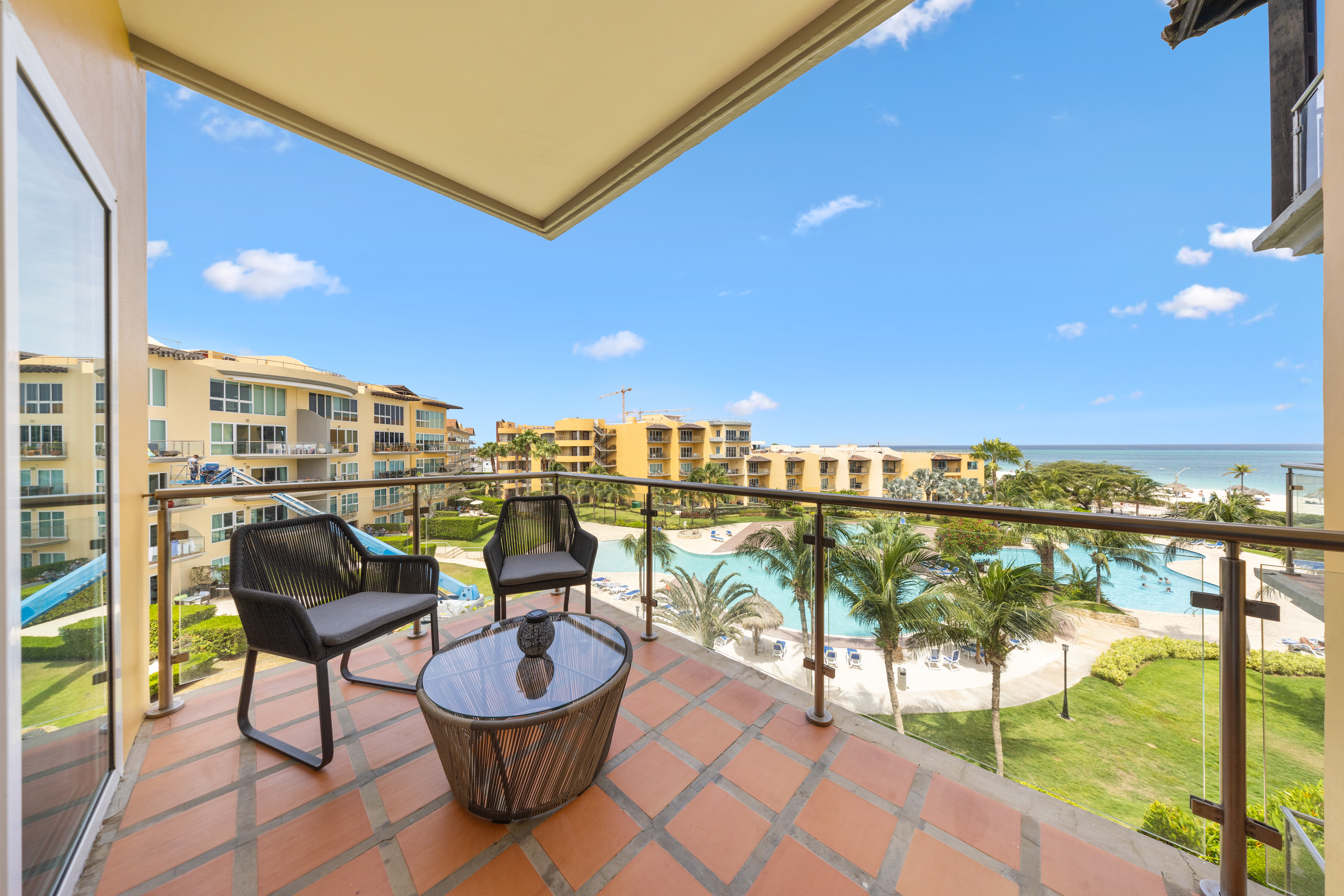 Opulent Balcony of the condo in Aruba with ocean views - Scenic private balcony for relaxation