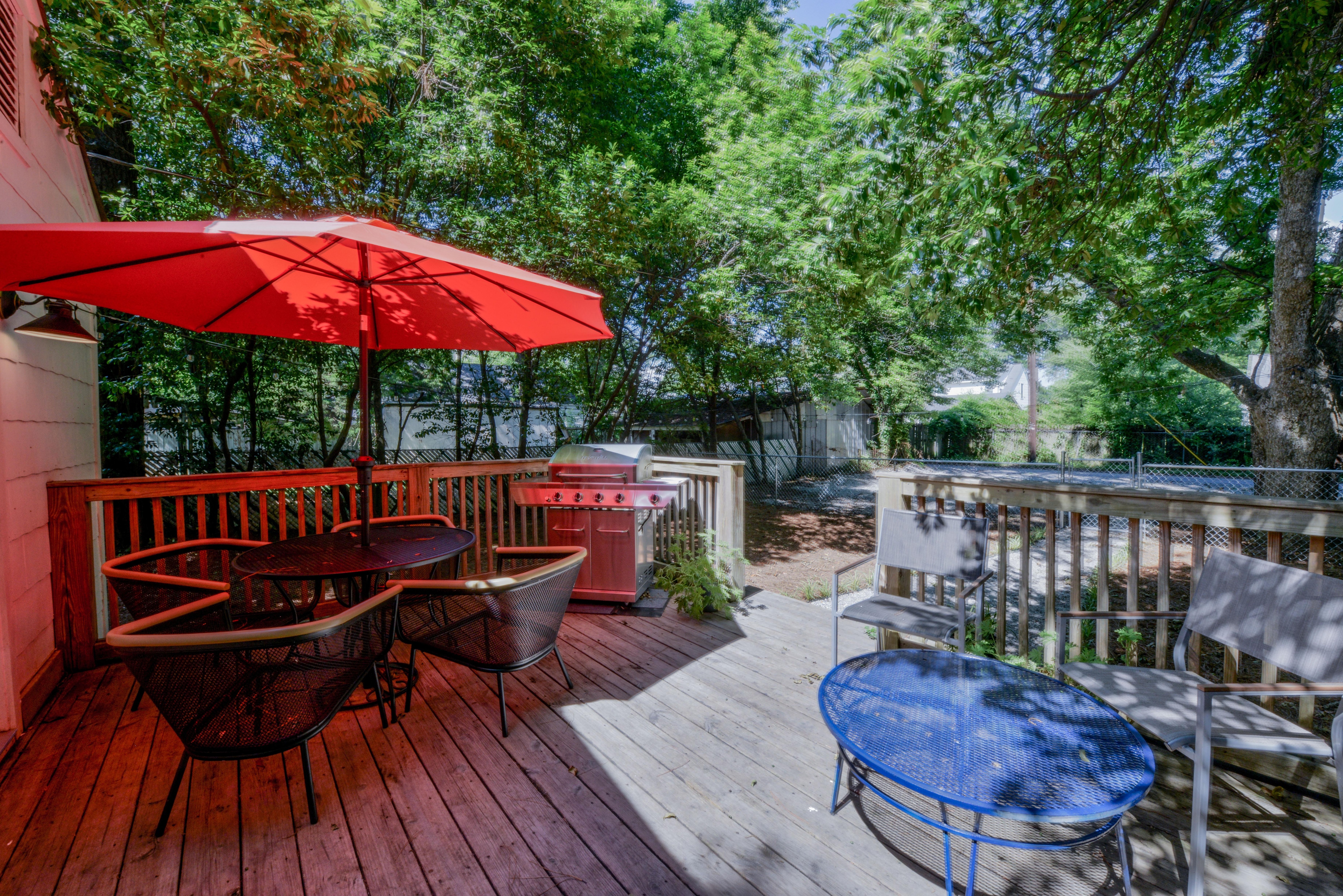 Enjoy grilling and eating outside on the back porch.