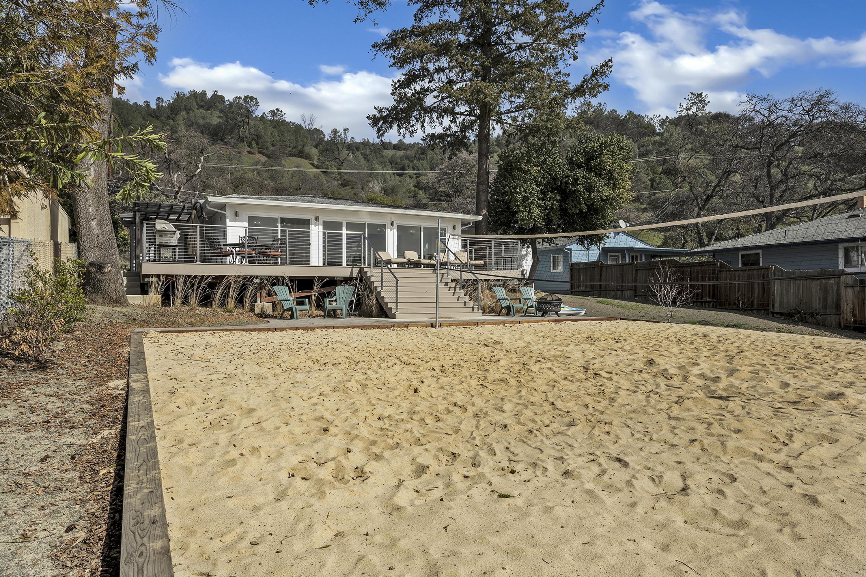 Property Image 2 - Sandy Feet Retreat -- lakefront Retreat with sand volleyball court!