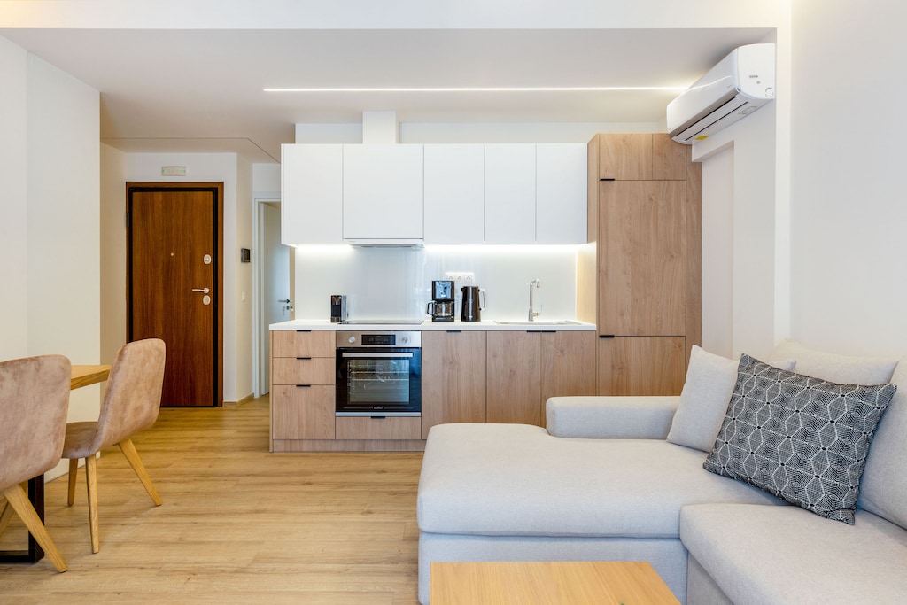 The beautifully laid living area comes with the latest conveniences like a big smart TV & A/C and a fully equipped open plan kitchen