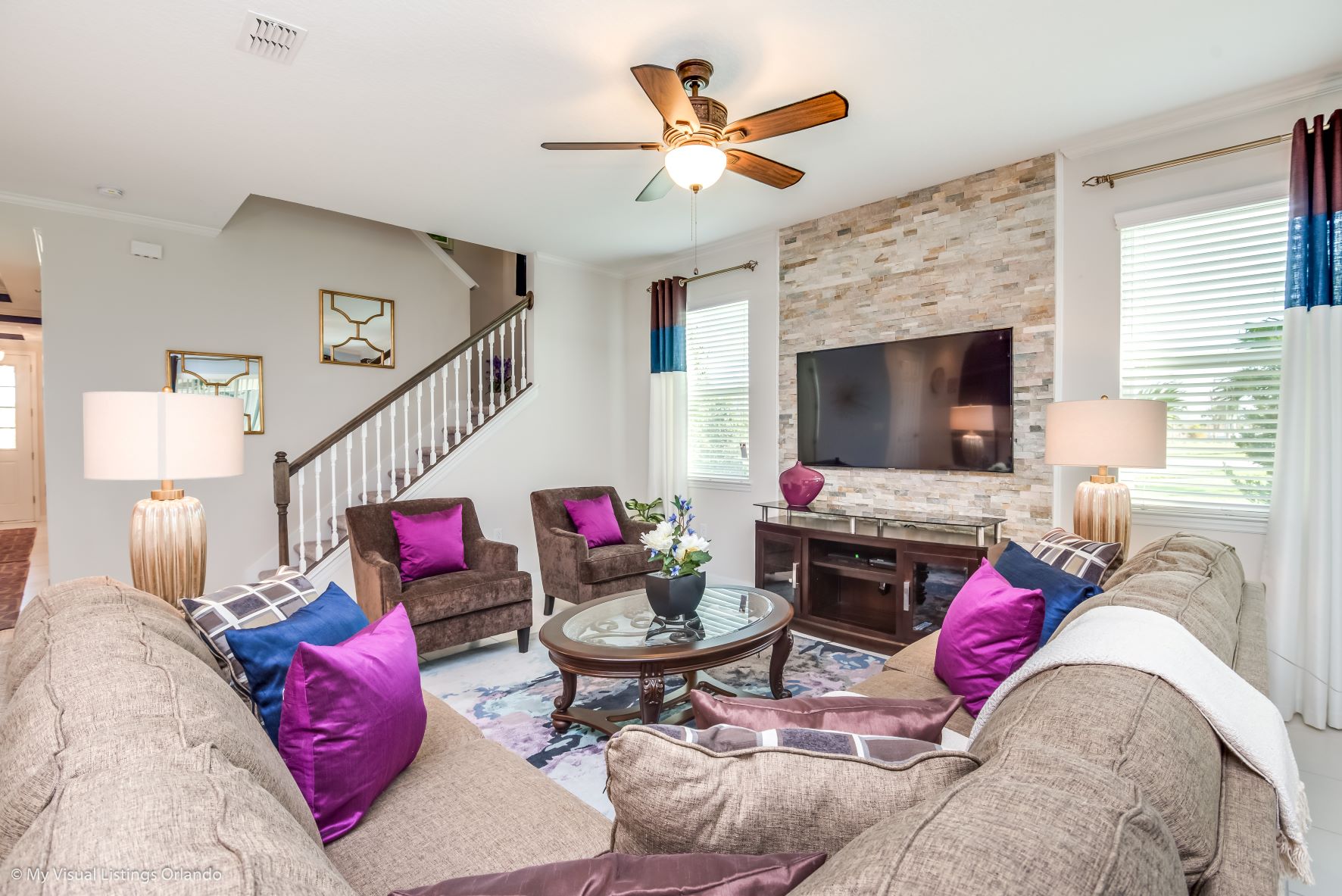 Inviting living area of the villa in Kissimmee Florida - Generous seating arrangements for socializing and lounging - Smart TV for entertainment - Indulge in relaxation in our spacious living area