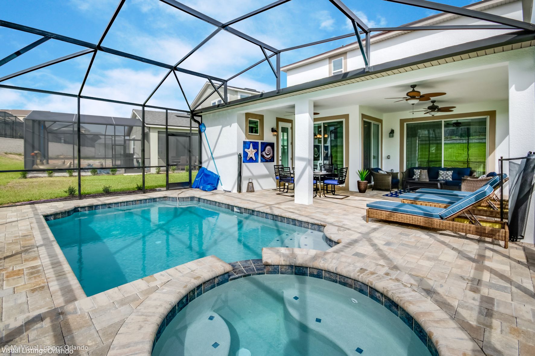 Peasant private pool area of the villa in Kissimmee Florida - Sparkling waters beckoning you to take a leisurely swim - Inviting poolside loungers for basking in the sunshine