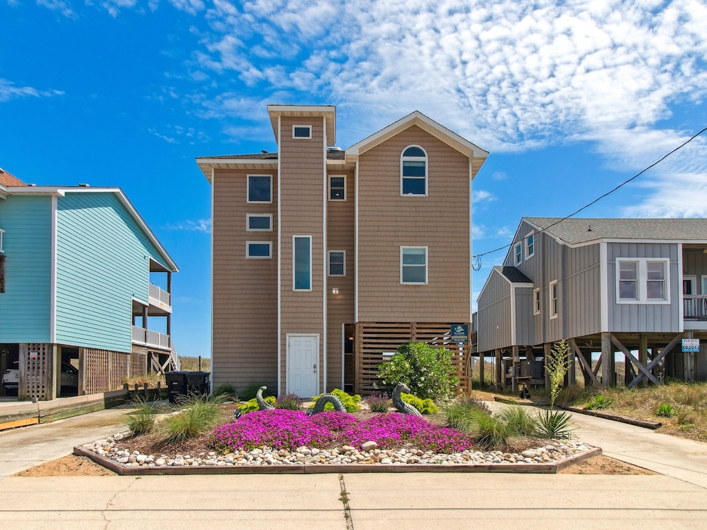 This 4-Bedroom, 4-Bathroom Oceanfront home is conveniently located in the heart of Kill Devil Hills and has everything that you could possibly need to enjoy an amazing Outer Banks vacation.