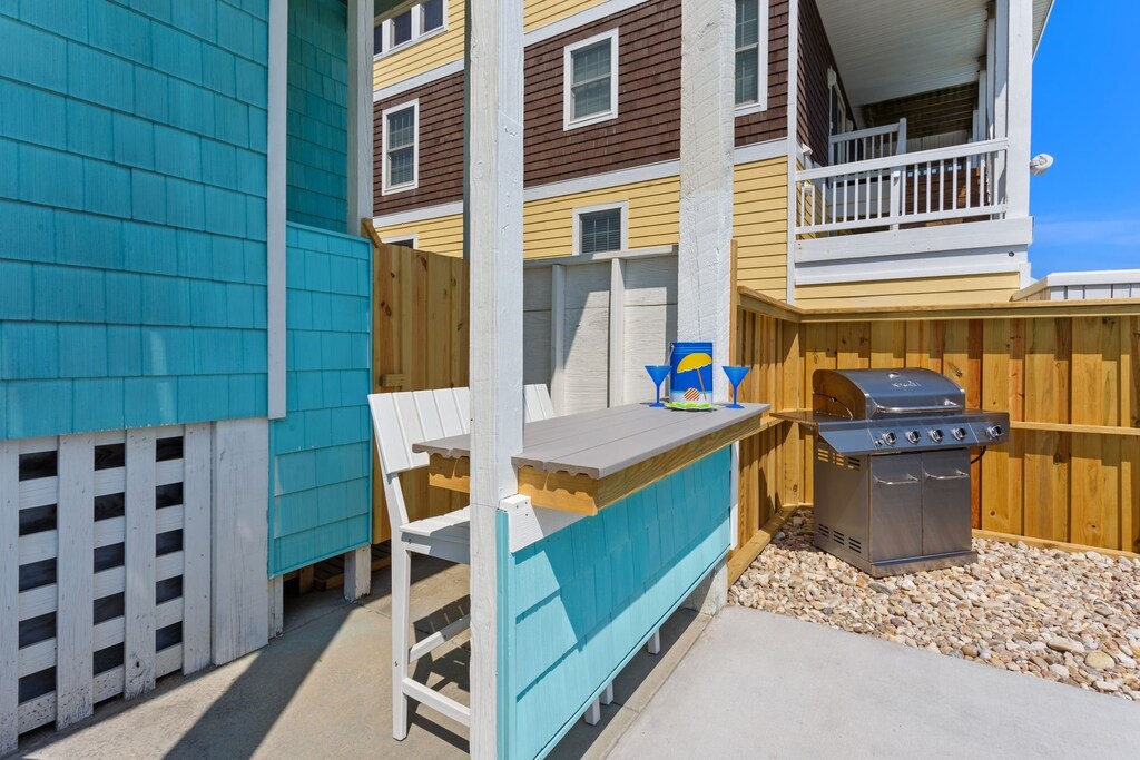 Enjoy drinks and grilling at the poolside Tiki Bar!