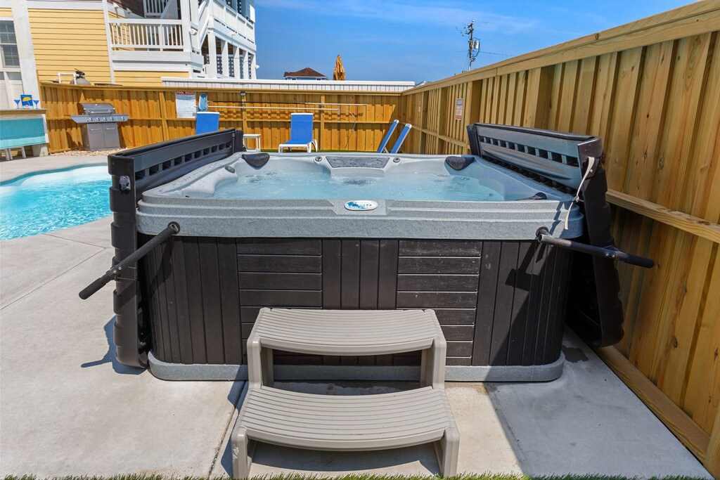 Relax in the bubbly Hot Tub after a day of exciting Outer Banks adventures.