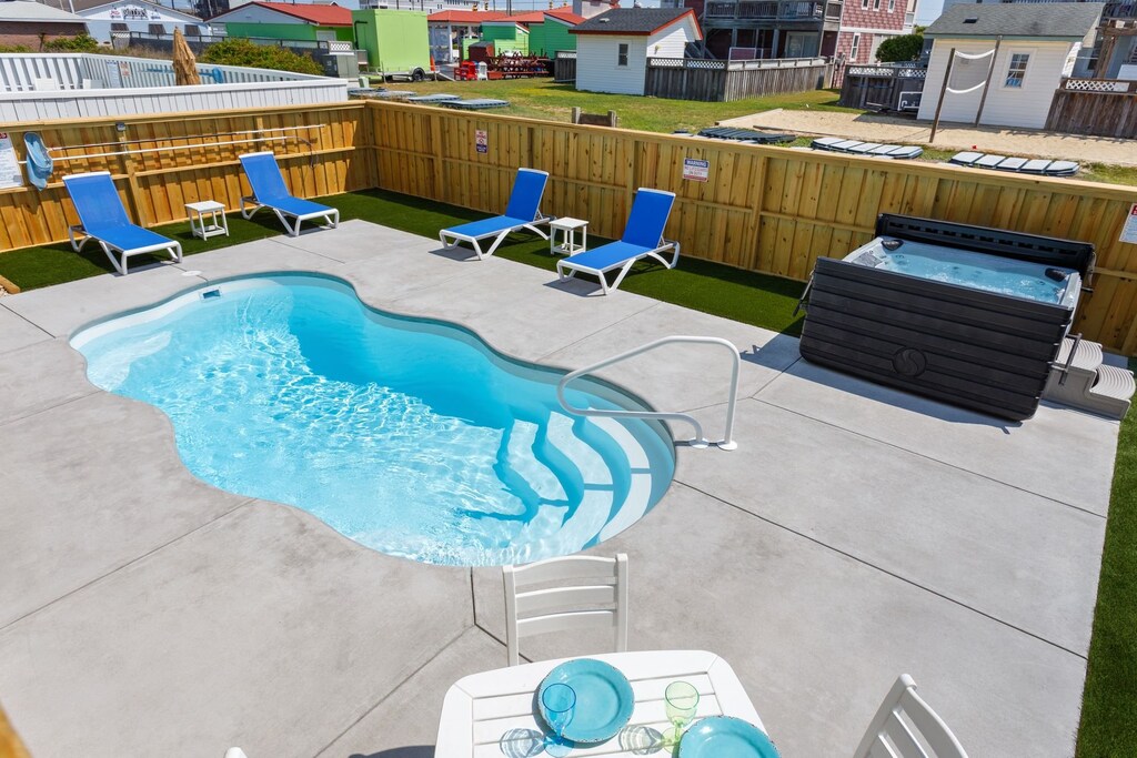 Relax by the Private Pool and soak in the bubbly Hot Tub after a day at the beach!