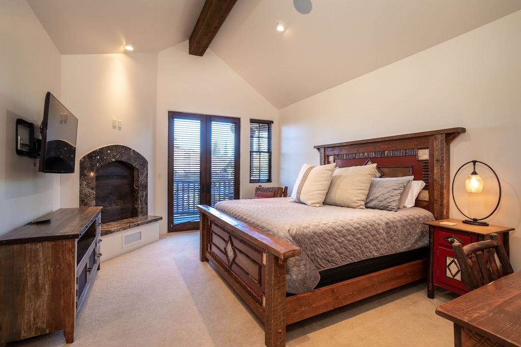 Get cozy by the fireplace before bed | King Bed | Upper Level