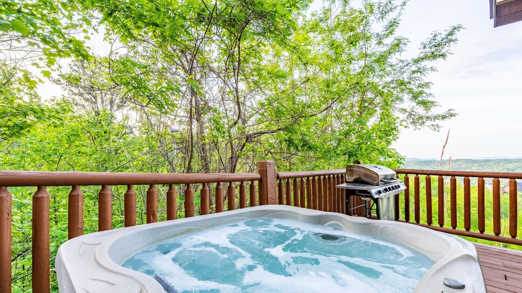 Fire up the grill while enjoying the private hot tub.