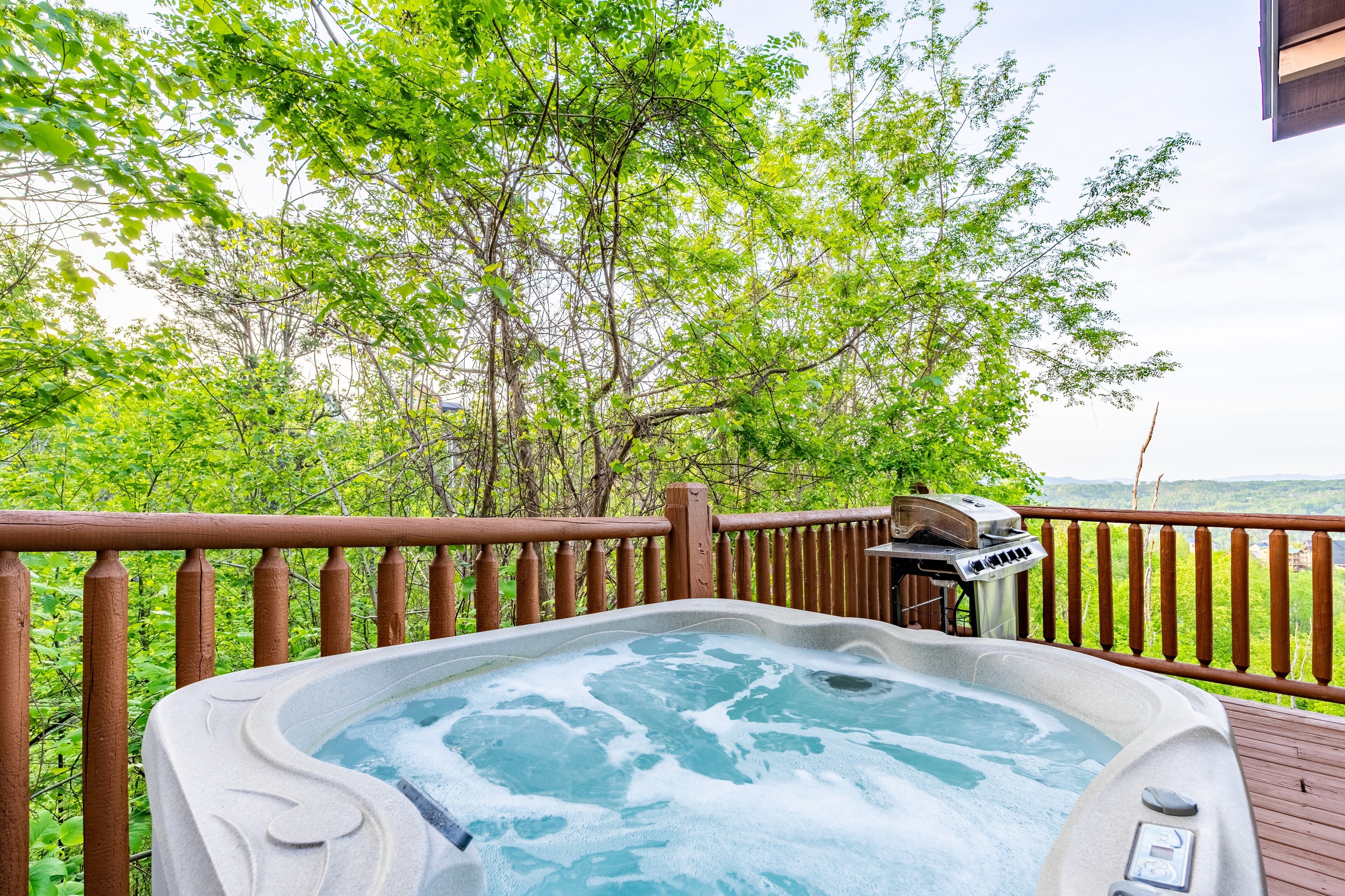 Fire up the grill while enjoying the private hot tub.