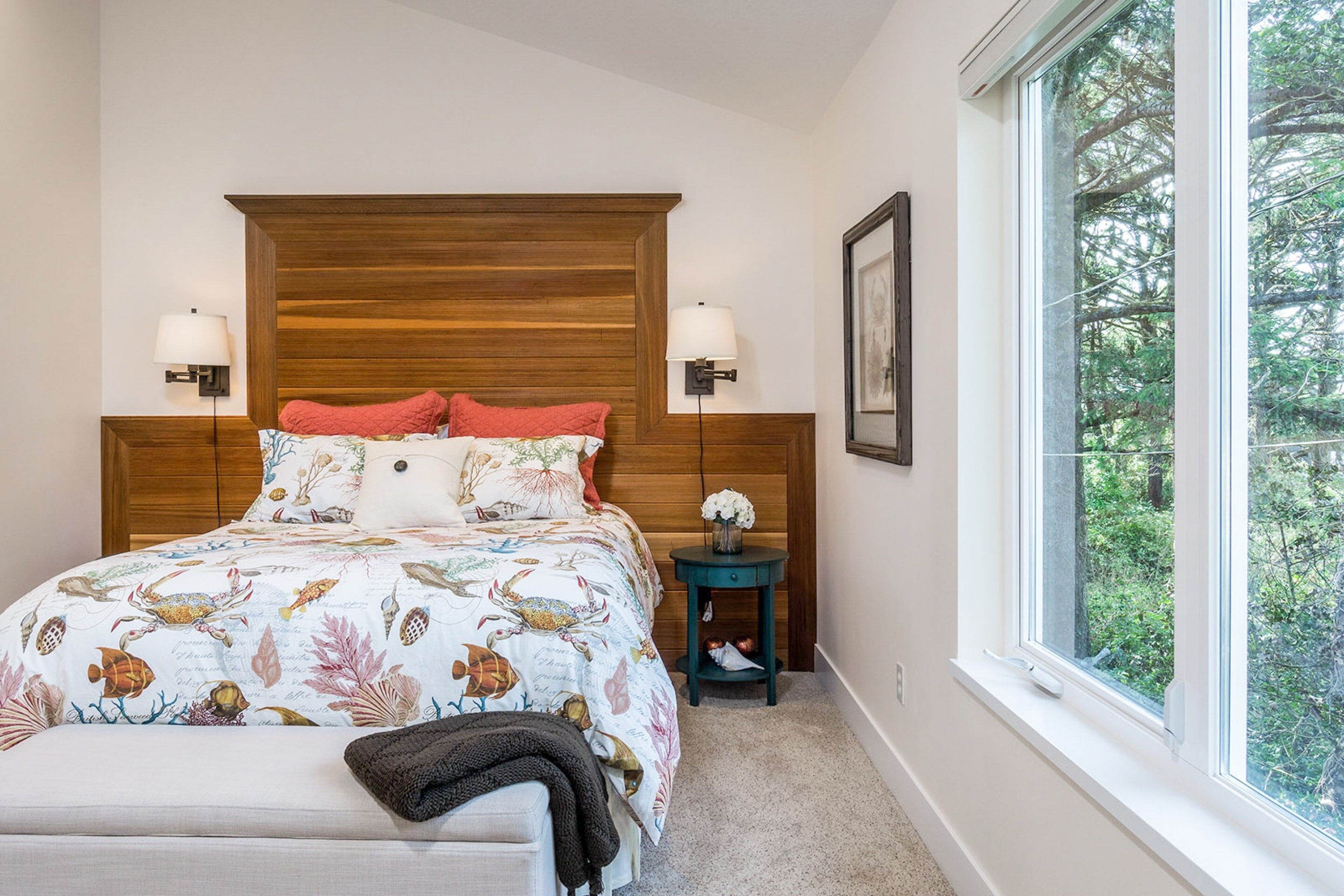 Bedroom 2 is the Neahkahnie Mountain view room and features a queen-sized pillow-top mattress wrapped in luxury linens.