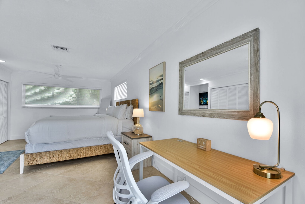 Bedroom 1 with King bed
En suite
Patio Doors 
Desk and Chair