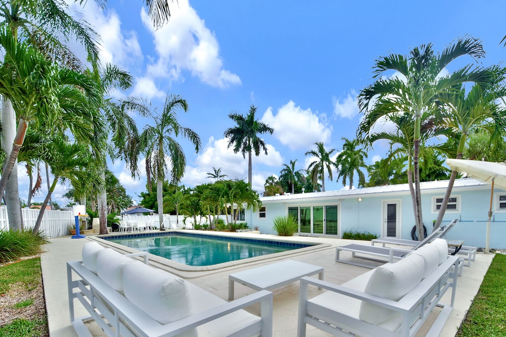 Comfortable seating and a heated pool - the perfect way to enjoy the Florida climate all year round