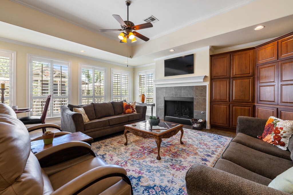 Comfortable Living Room with Reclining Chairs , Smart TV and Gas Fireplace