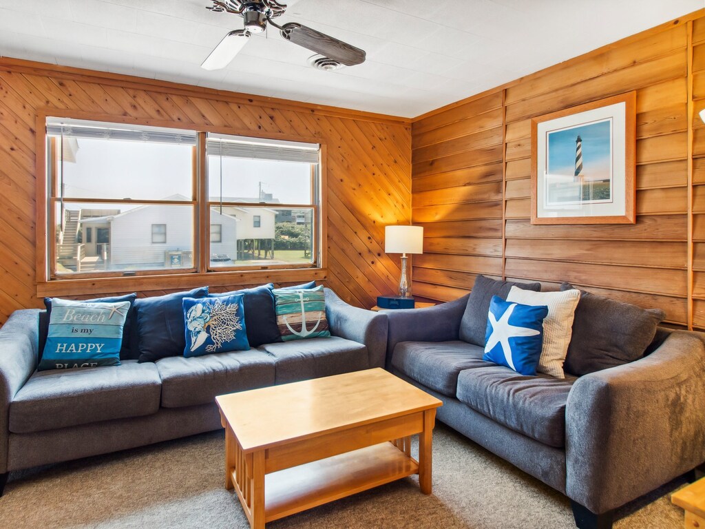 The Main Level Living Area is perfect for relaxing after a day at the beach.