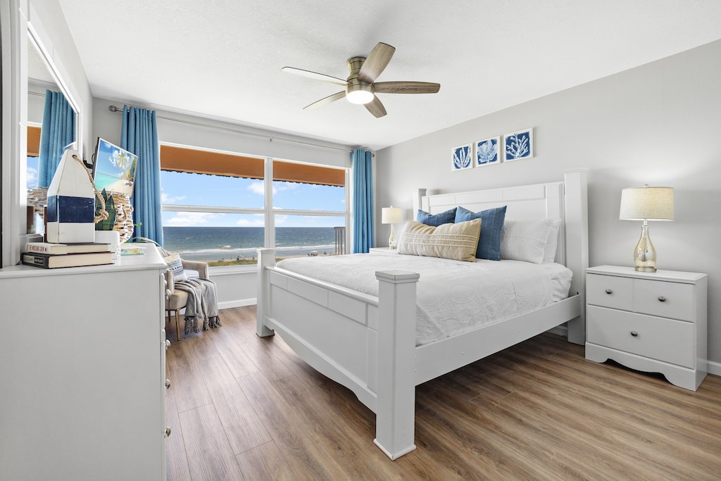 Master bedroom featuring a plush king-size bed.