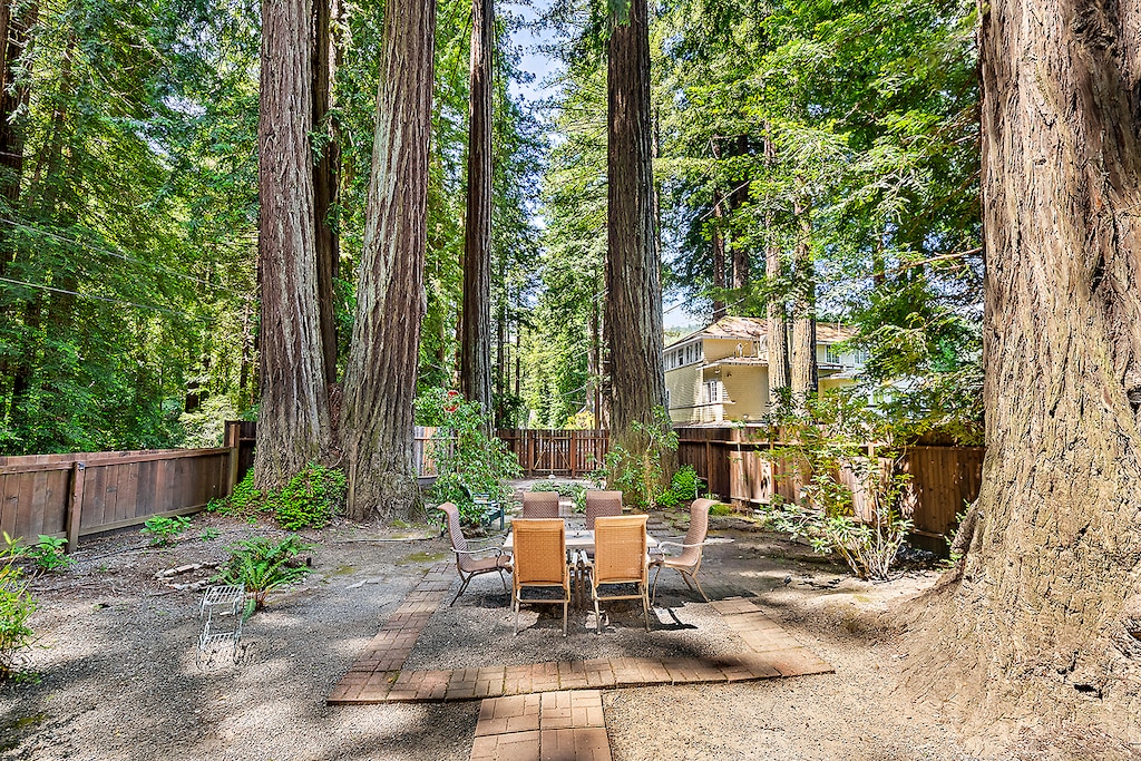 Outdoor dining for six and room for the kids and dogs to play in the fully fenced yard.