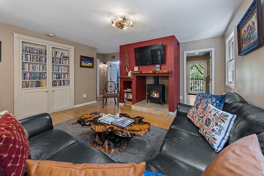 Take in all the natural wood touches and snuggle by the stove.