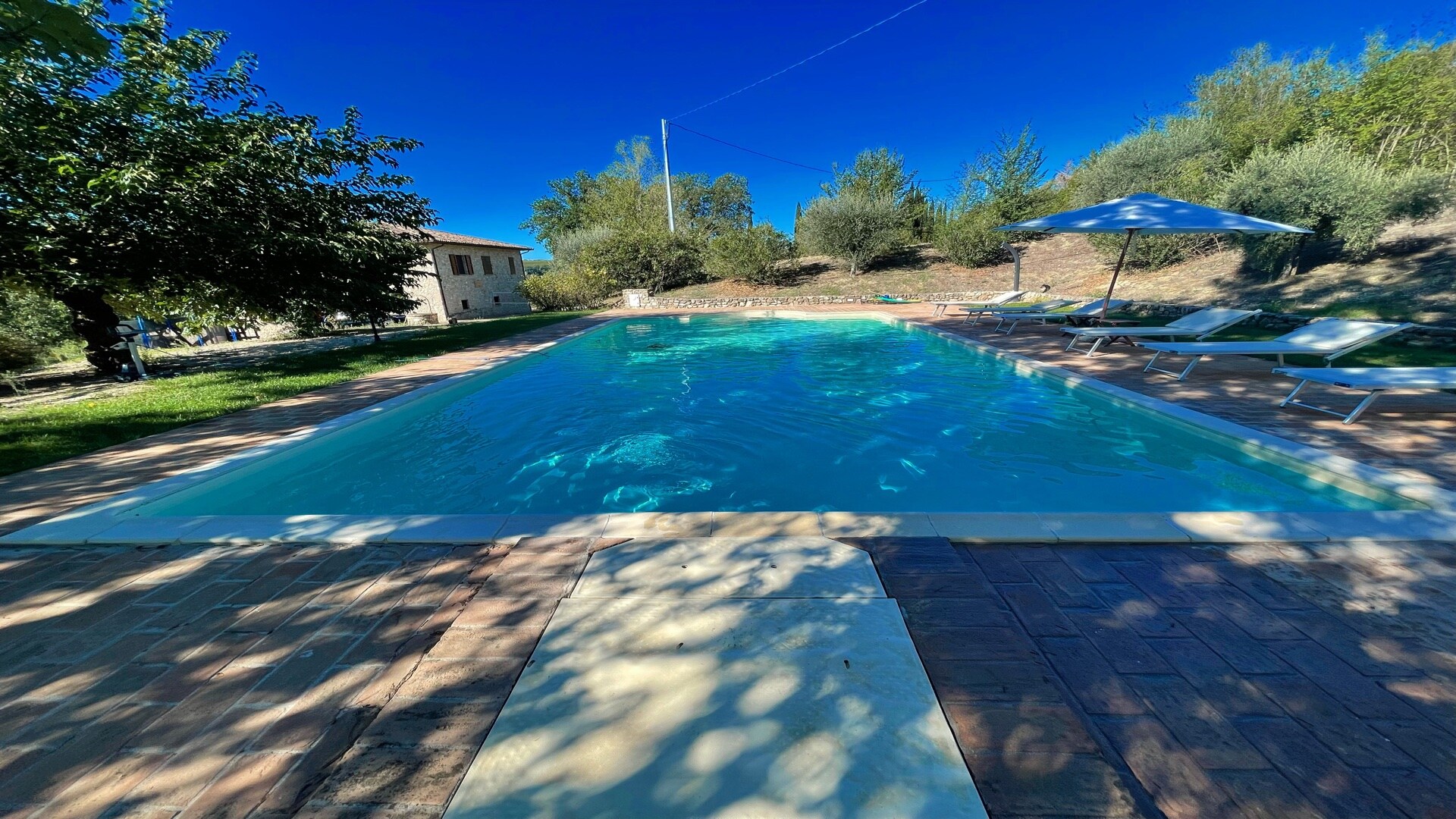 Property Image 2 - Sleeps 10. Pool, grounds, villa, veranda, child play area - all beautiful. Wifi