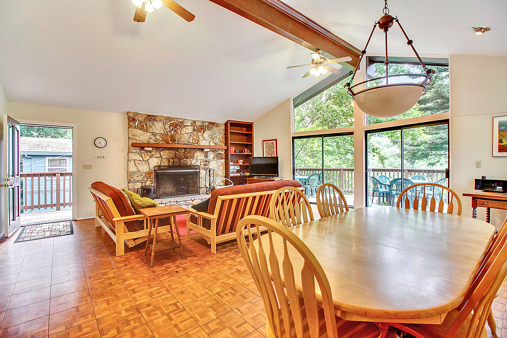 Wood burning fireplace and 2 Queen futons in the living room.