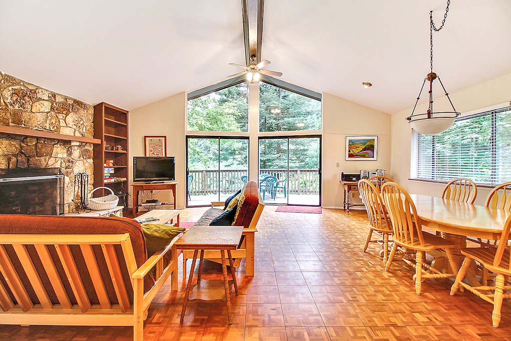 Open living room, dining area, and kitchen for conversation.
