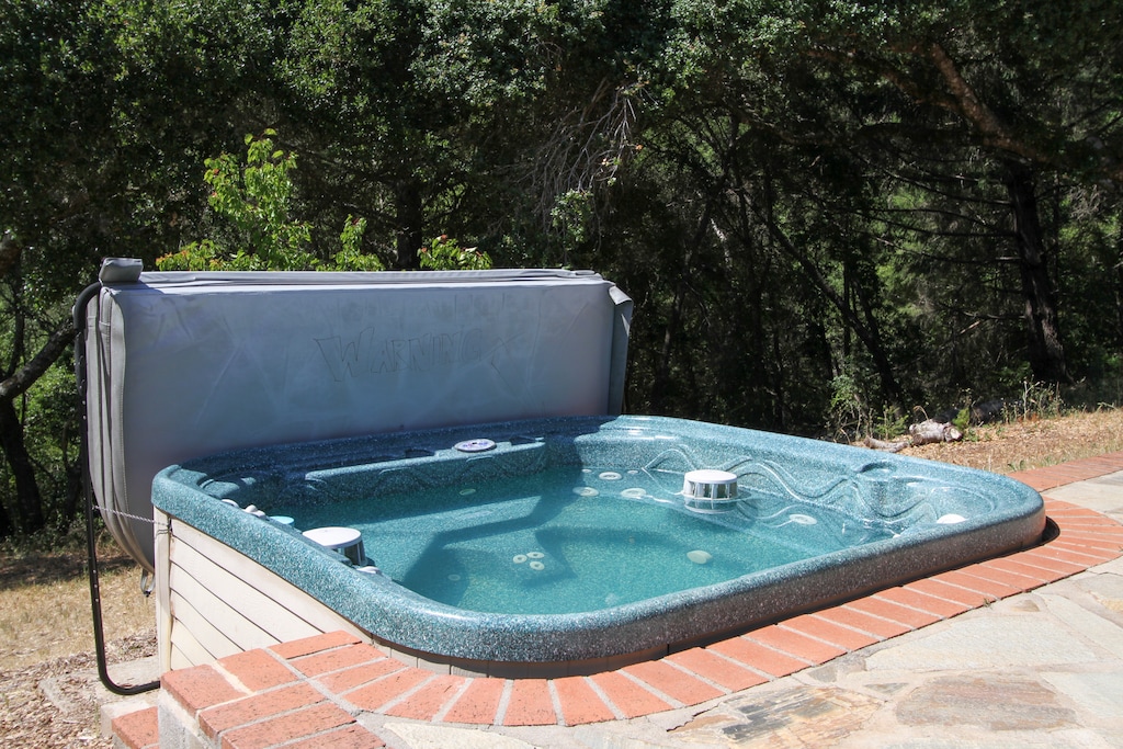 Soak after a hike or wine tasting in the hot tub just steps from the pool and pool house.