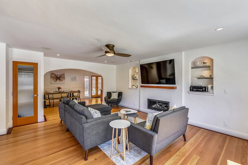 Open and bright - a contemporary living room opens to dining