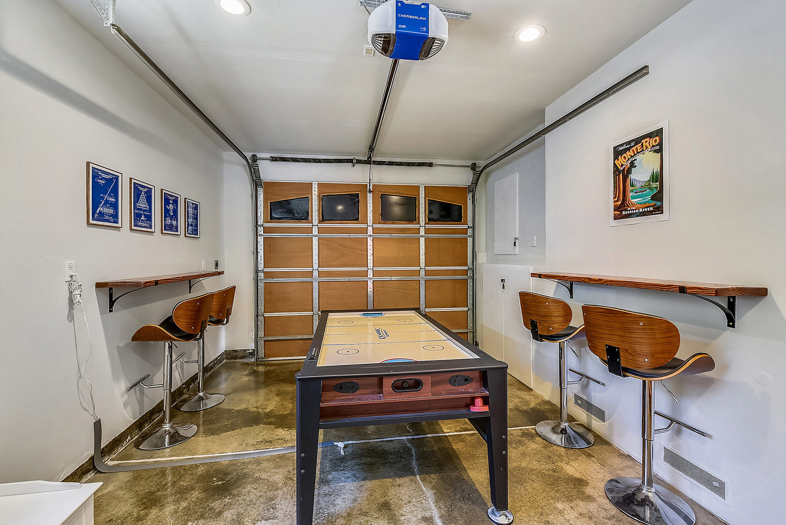 Air hockey in the converted garage to game room!