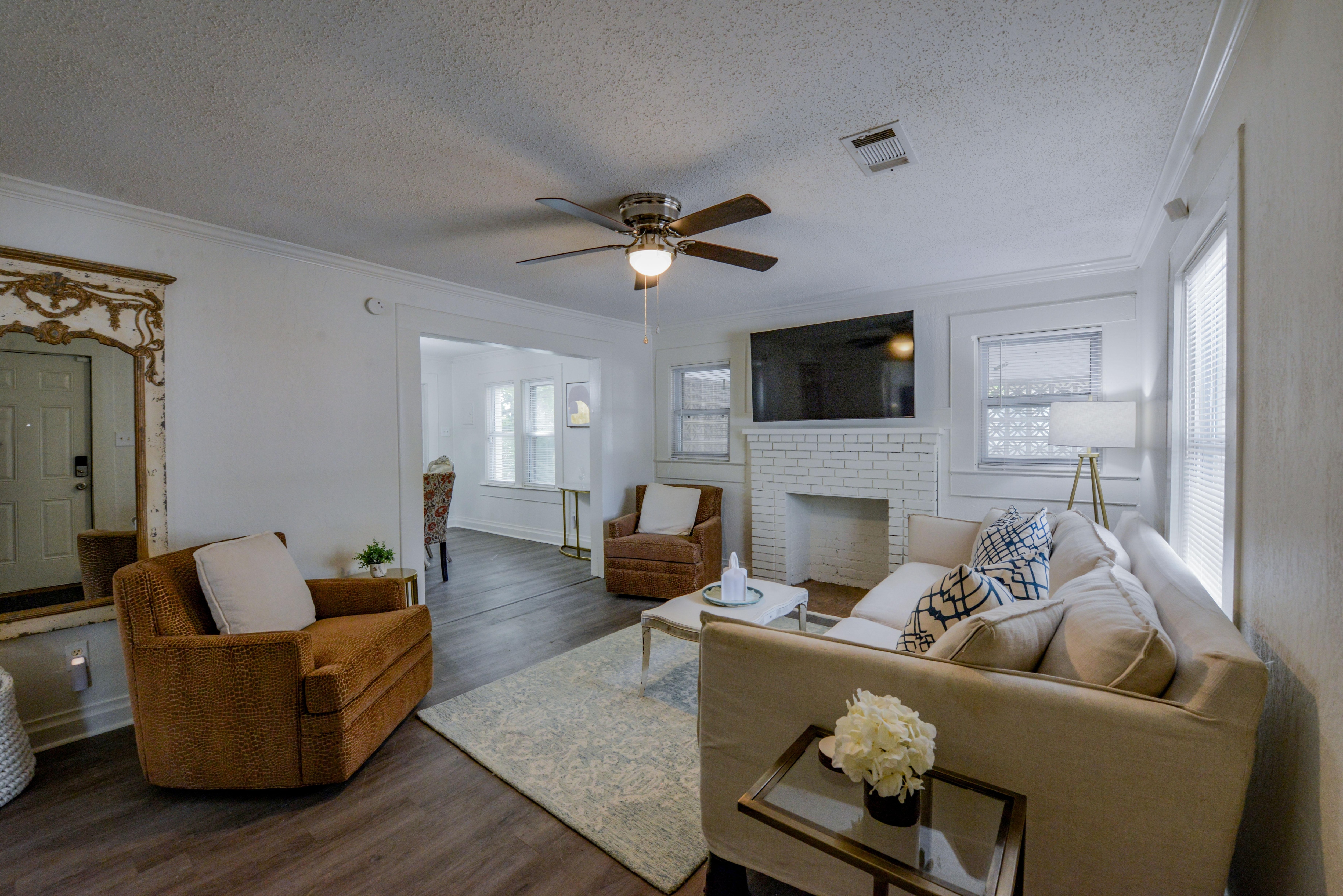 The living room has comfortable seating for your group to watch movies or an Alabama Football game.