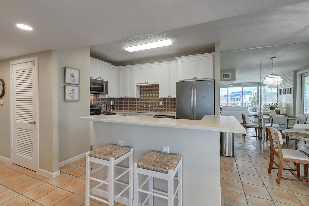 Interior. Spacious Kitchen Island with Convenient Seating