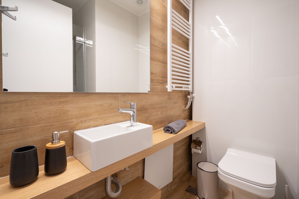 There is a heated towel rack in the bathroom