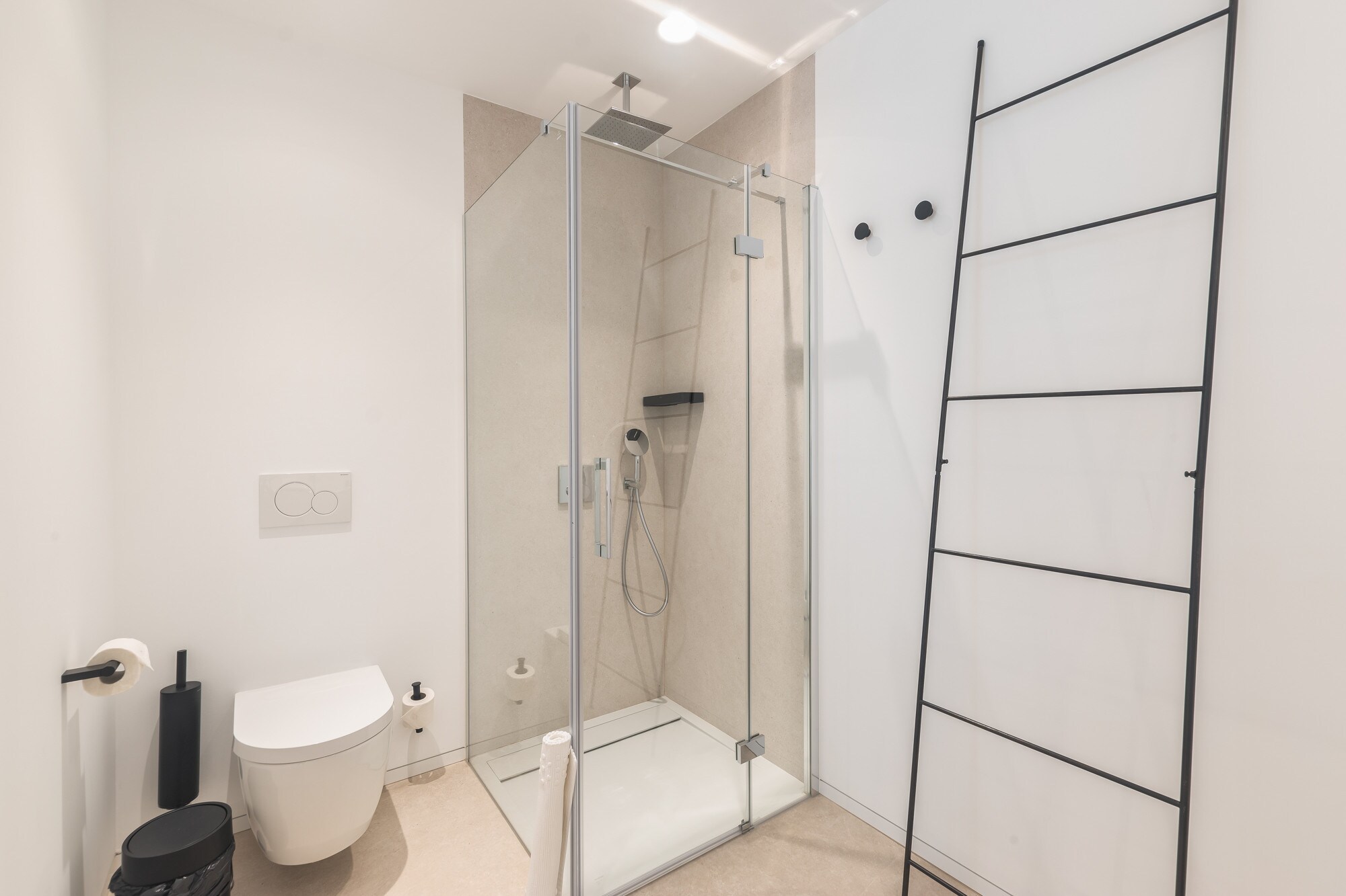 Spacious bathroom with bath and floor-level walk-in shower