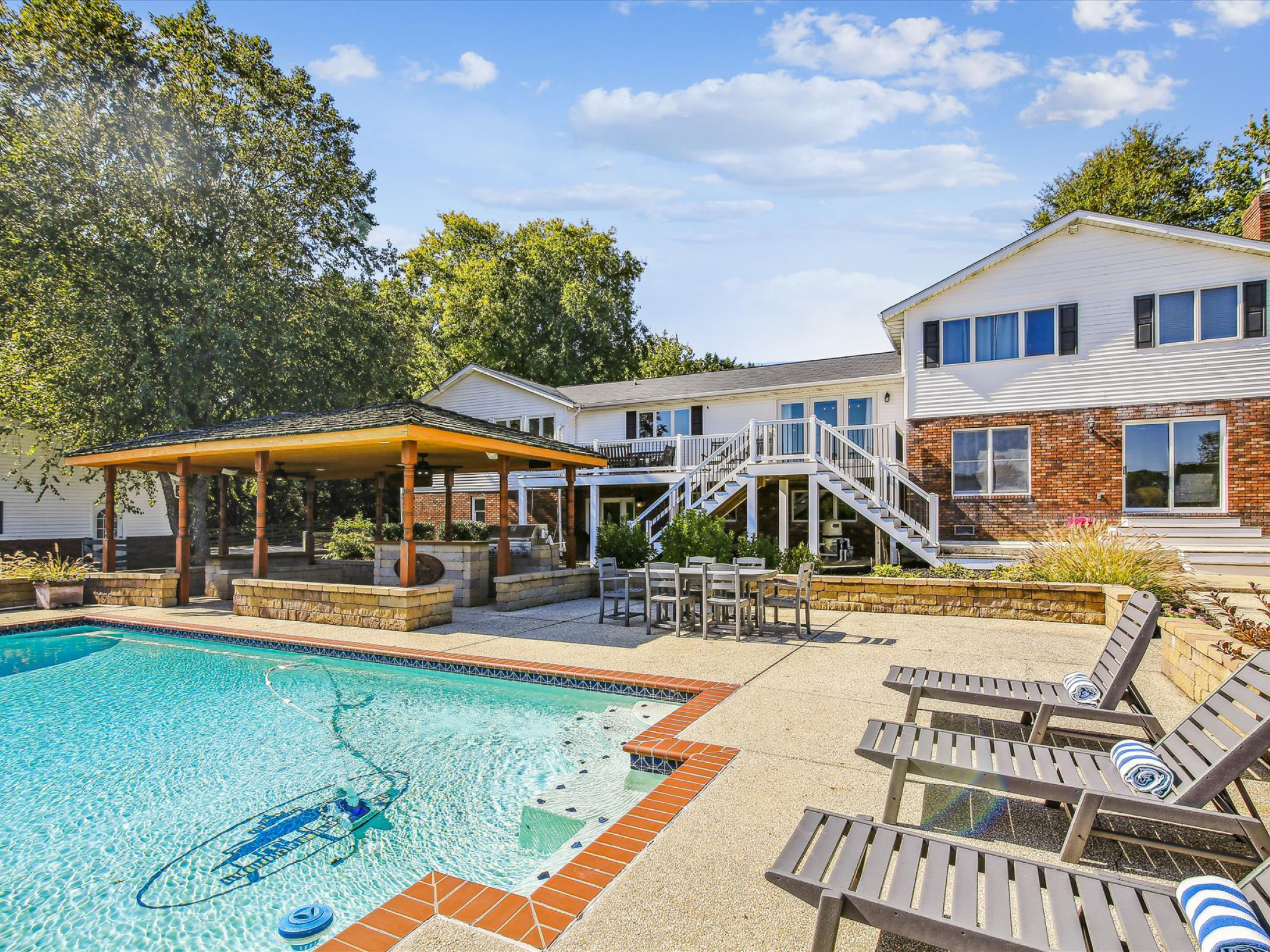 backside of house & swimming pool