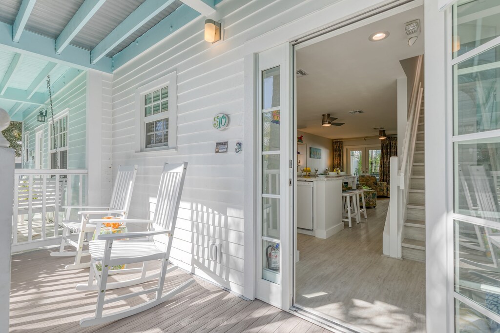 Balcony off the kitchen. Large doors let in fresh air.