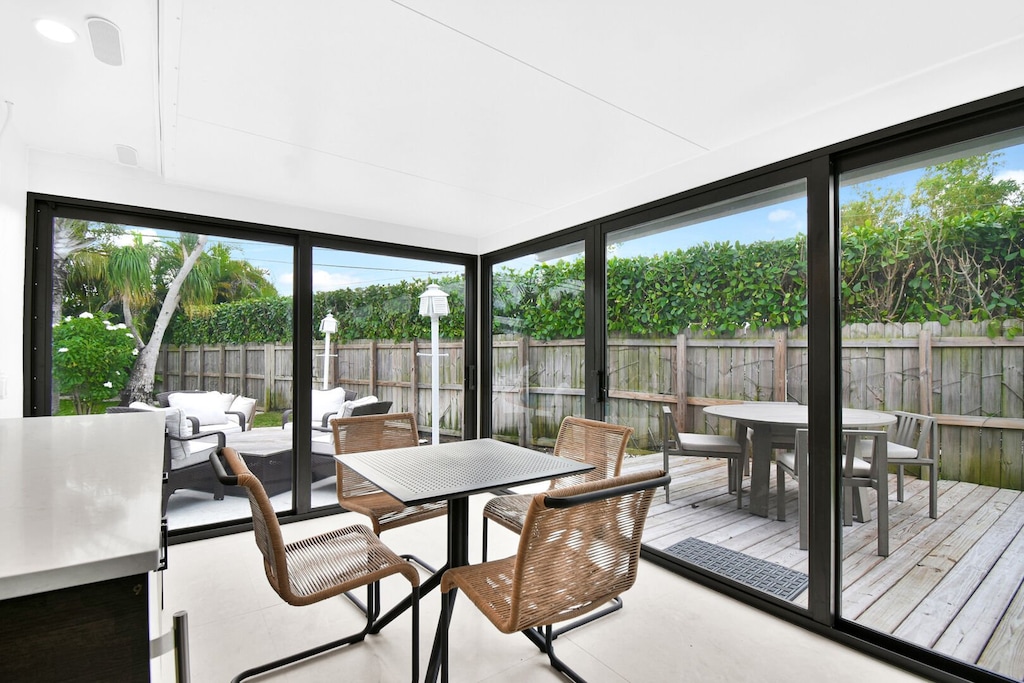 Dining Area in glass extension with view of yard