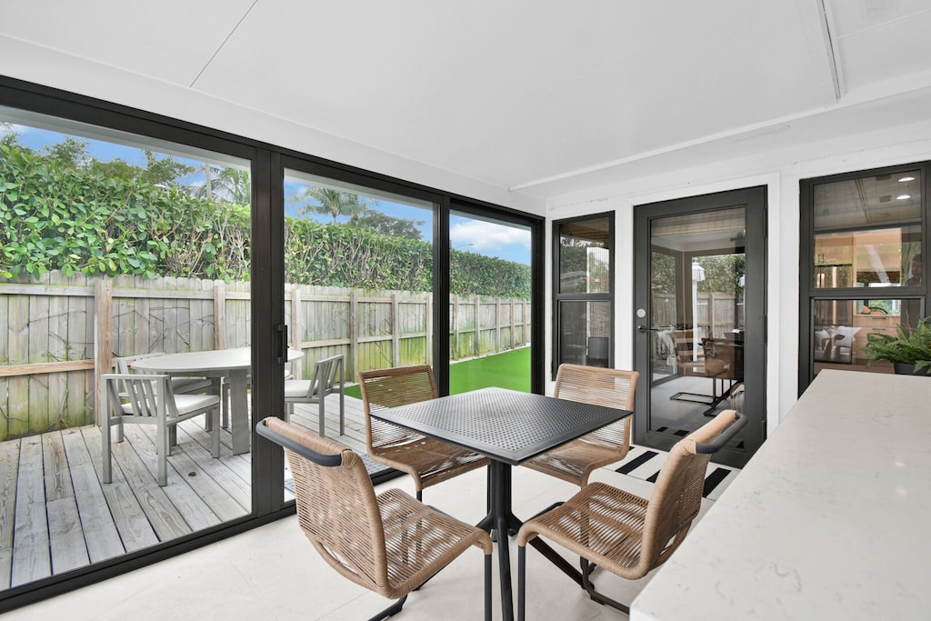 Dining Area in glass extension with view of yard