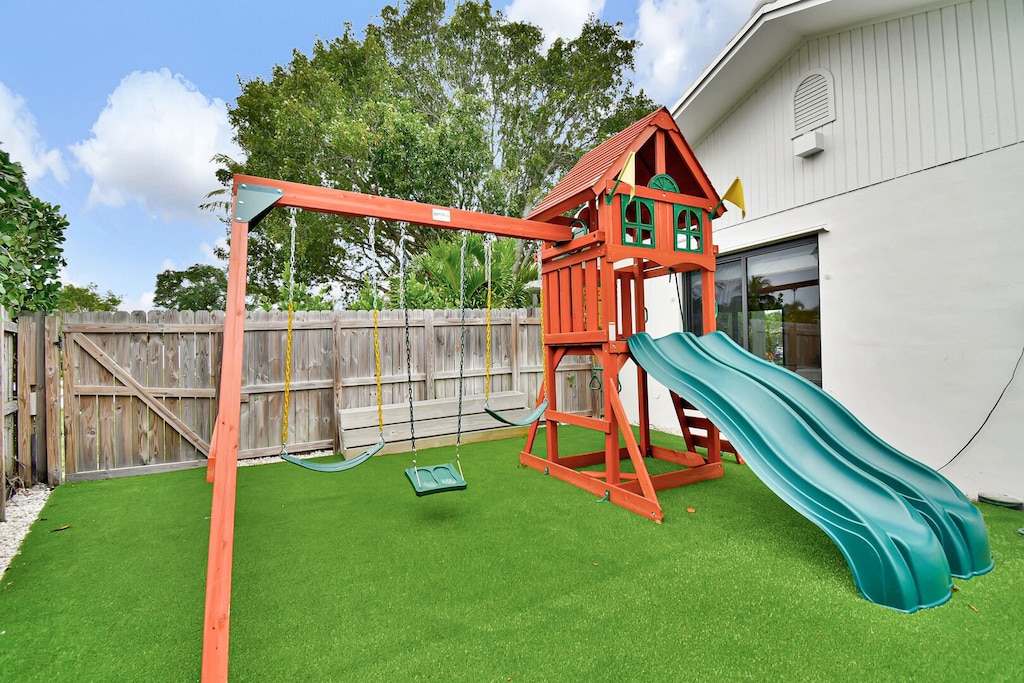 Brand new slide and swing set for your childs enjoyment.
